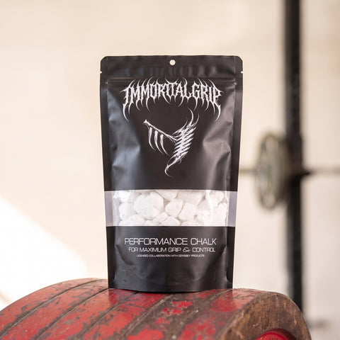 Immortal Grip Chalk pouch on a red weight plate