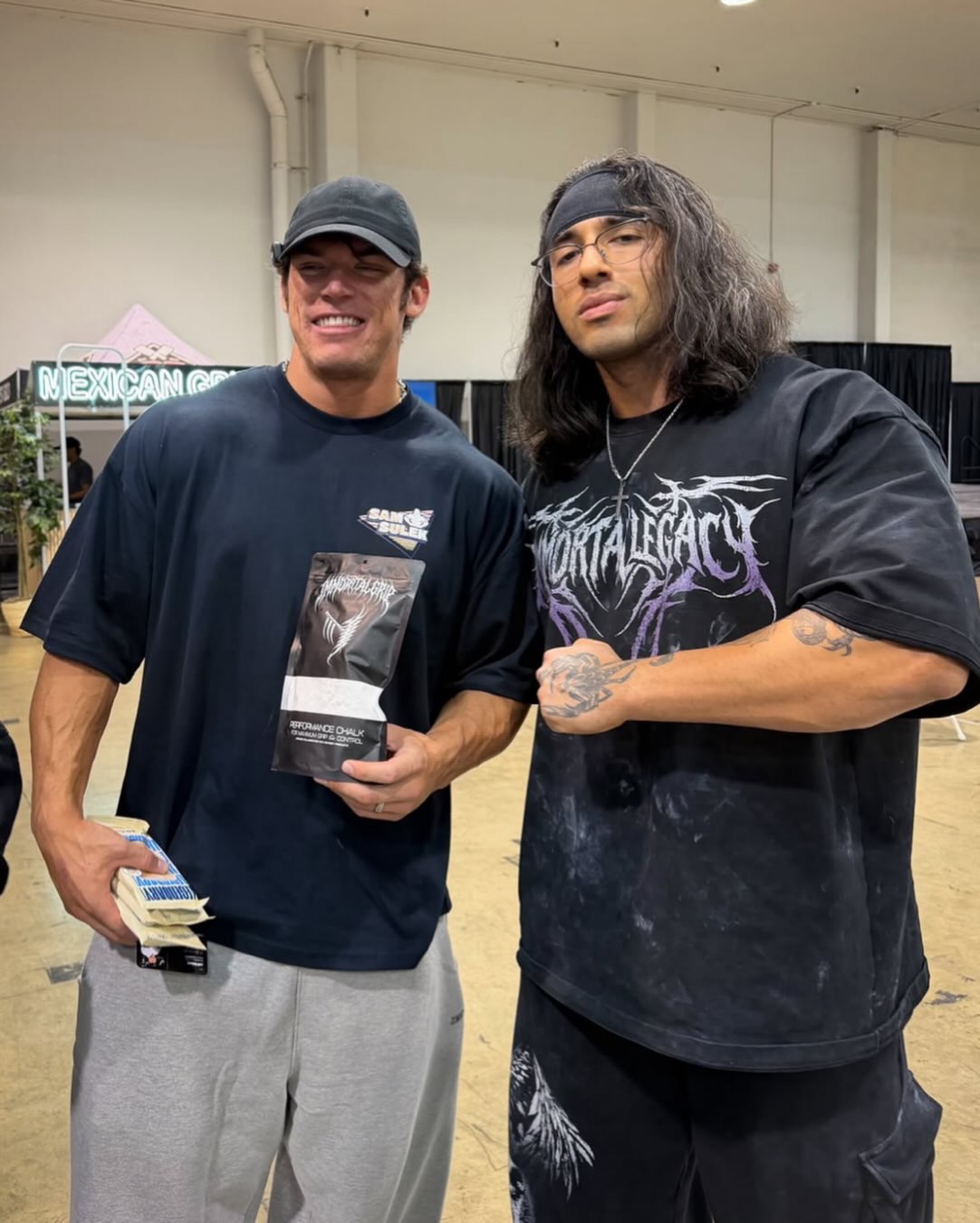 Sam Sulek and Professional Weak Guy holding Immortal Grip Chalk