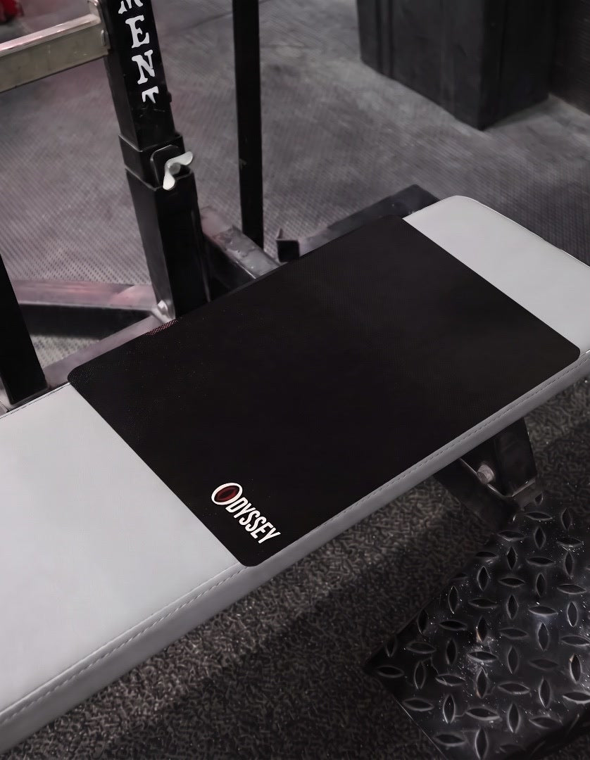 Odyssey Bench Mat V2 laid on a gym bench